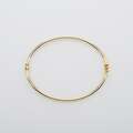 Bransoletka wykonana ze złota próby 585 w kształcie owalnym.
