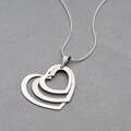 srebrny naszyjnik potrójne serce