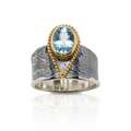 Pierścień ze srebra, z elemntami pozłacanymi, z topazem p817a.