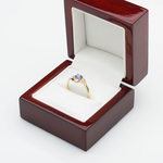 pierścionek zaręczynowy złoto, tanzanit,brylanty, zdjęcie w pudełku jubilerskim