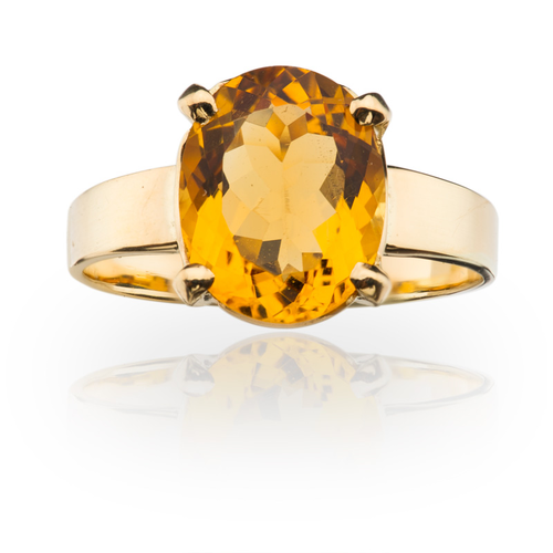 Klasyczny pierścionek z żółtego złota z dużym, naturalnym, owalnym cytrynem, oprawionym w klasyczne łapki. Producent: ADE ART- twojabizuteria