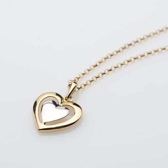 Serduszko ze złota na złotym łańcuszku.