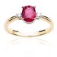 Gold ring with large ruby and diamonds.